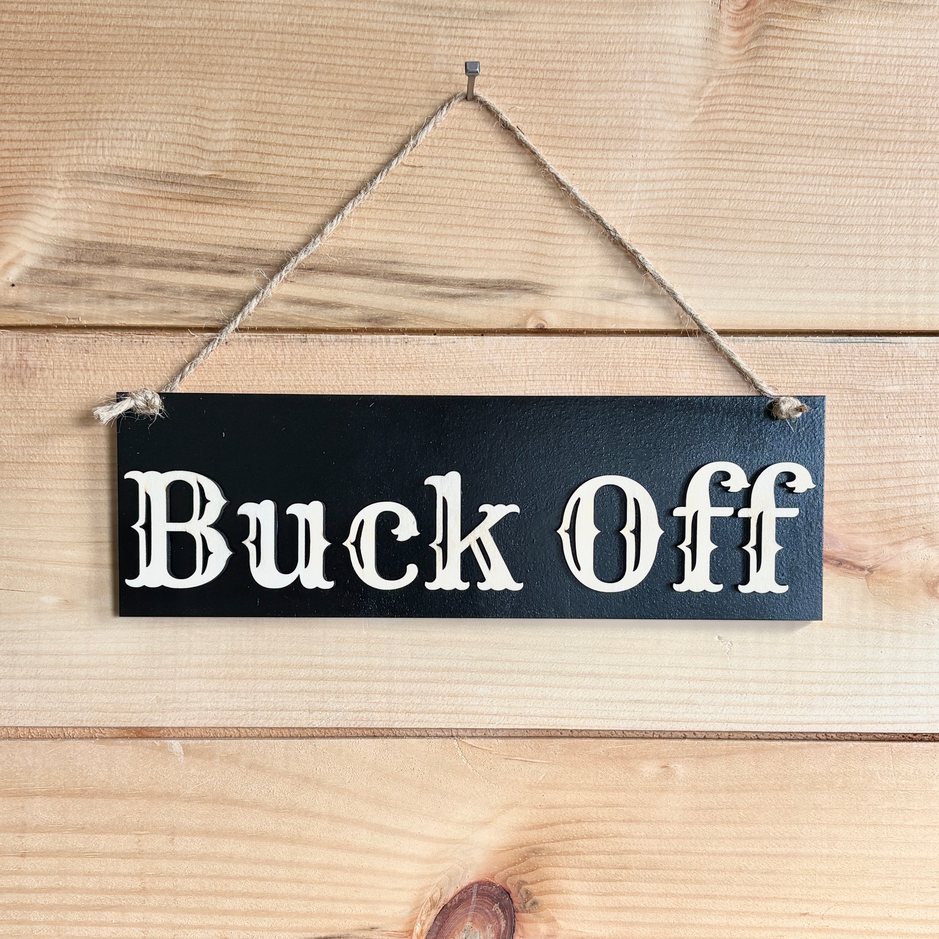 Buck Off sign