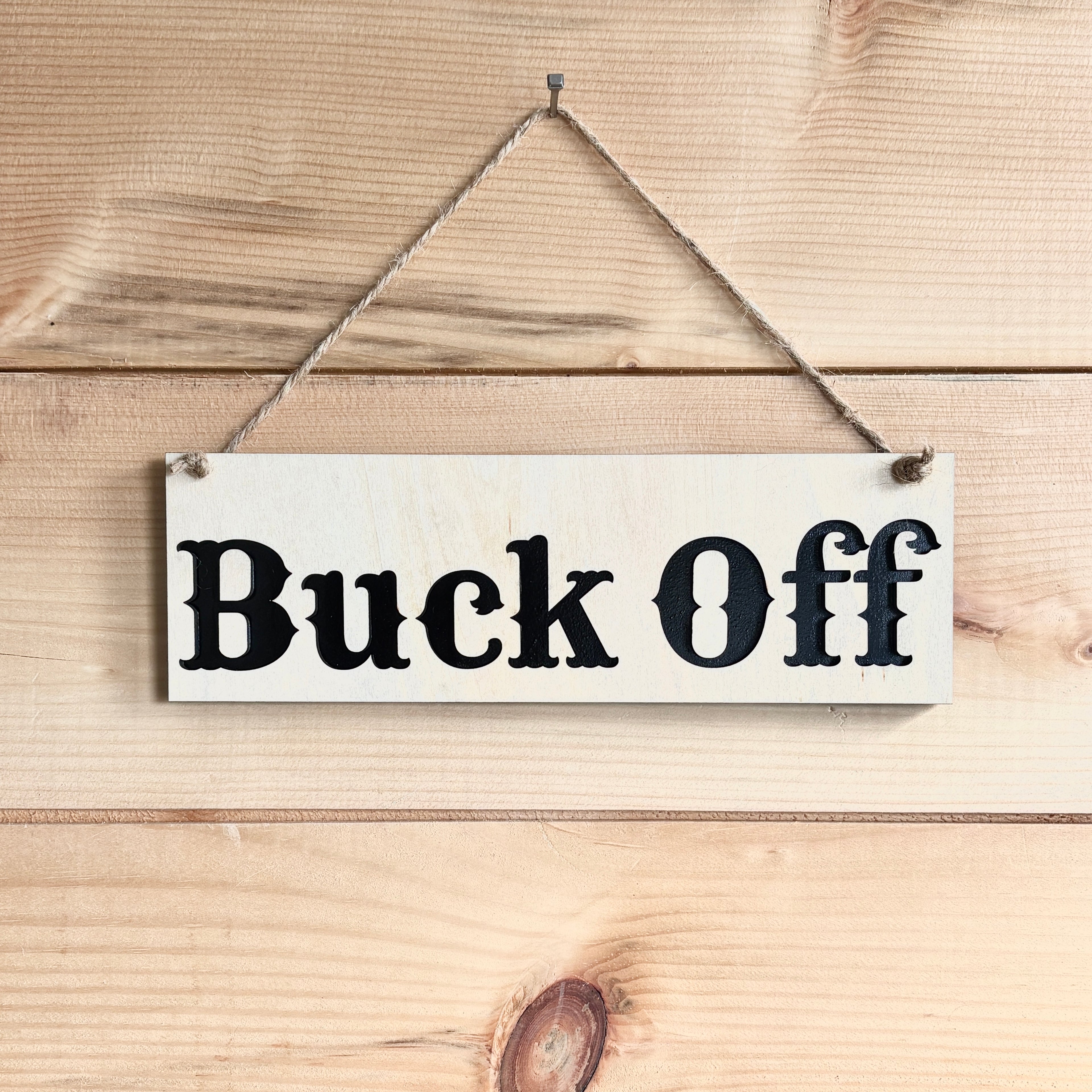 Buck Off sign