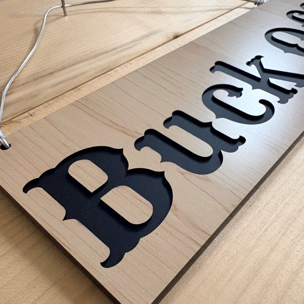 Buck Off sign