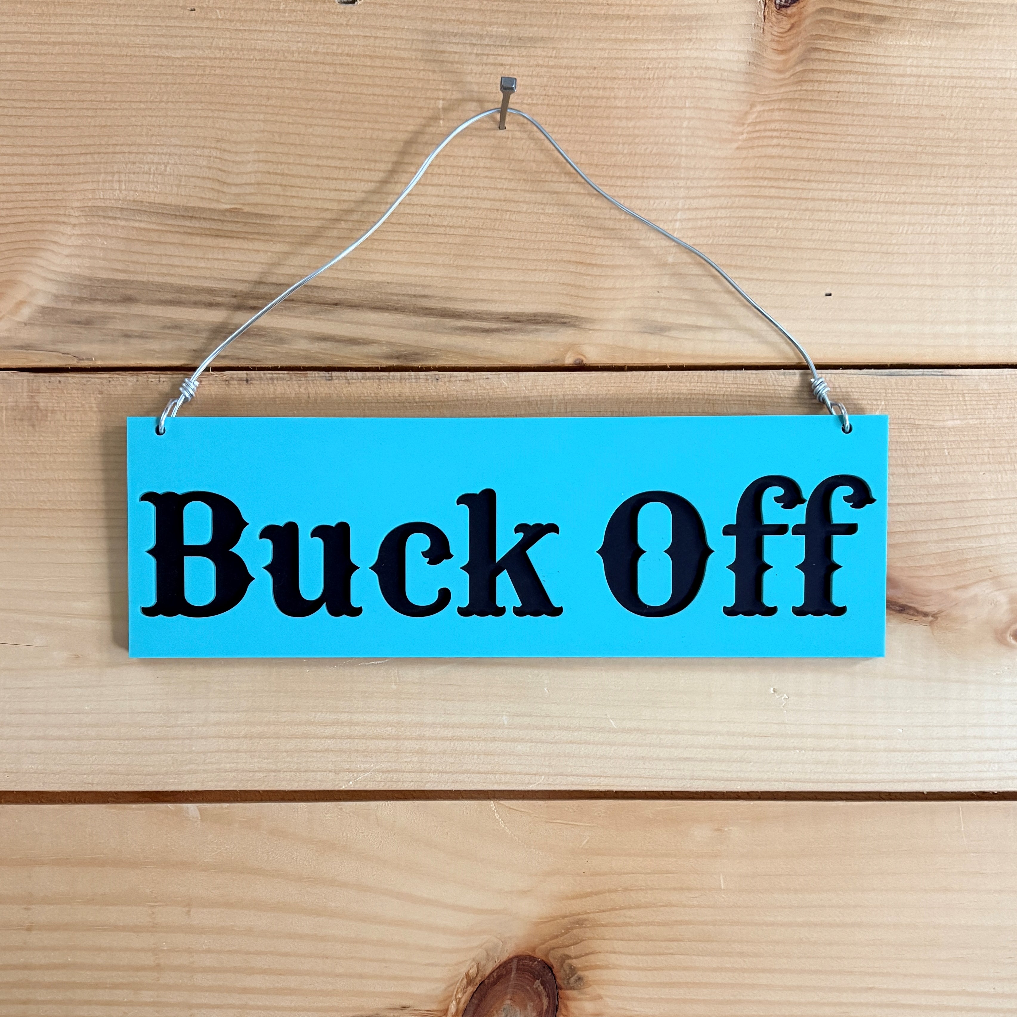 Buck Off sign
