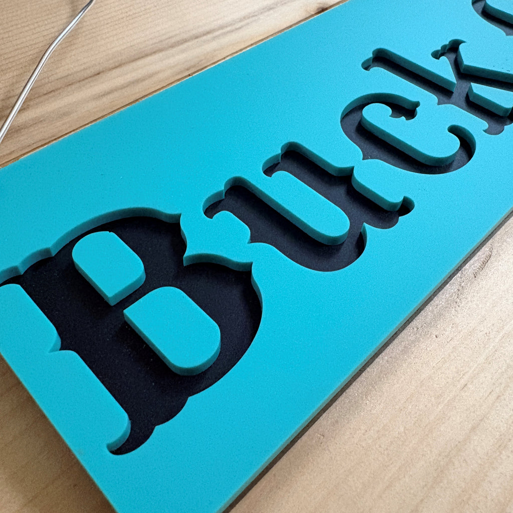 Buck Off sign