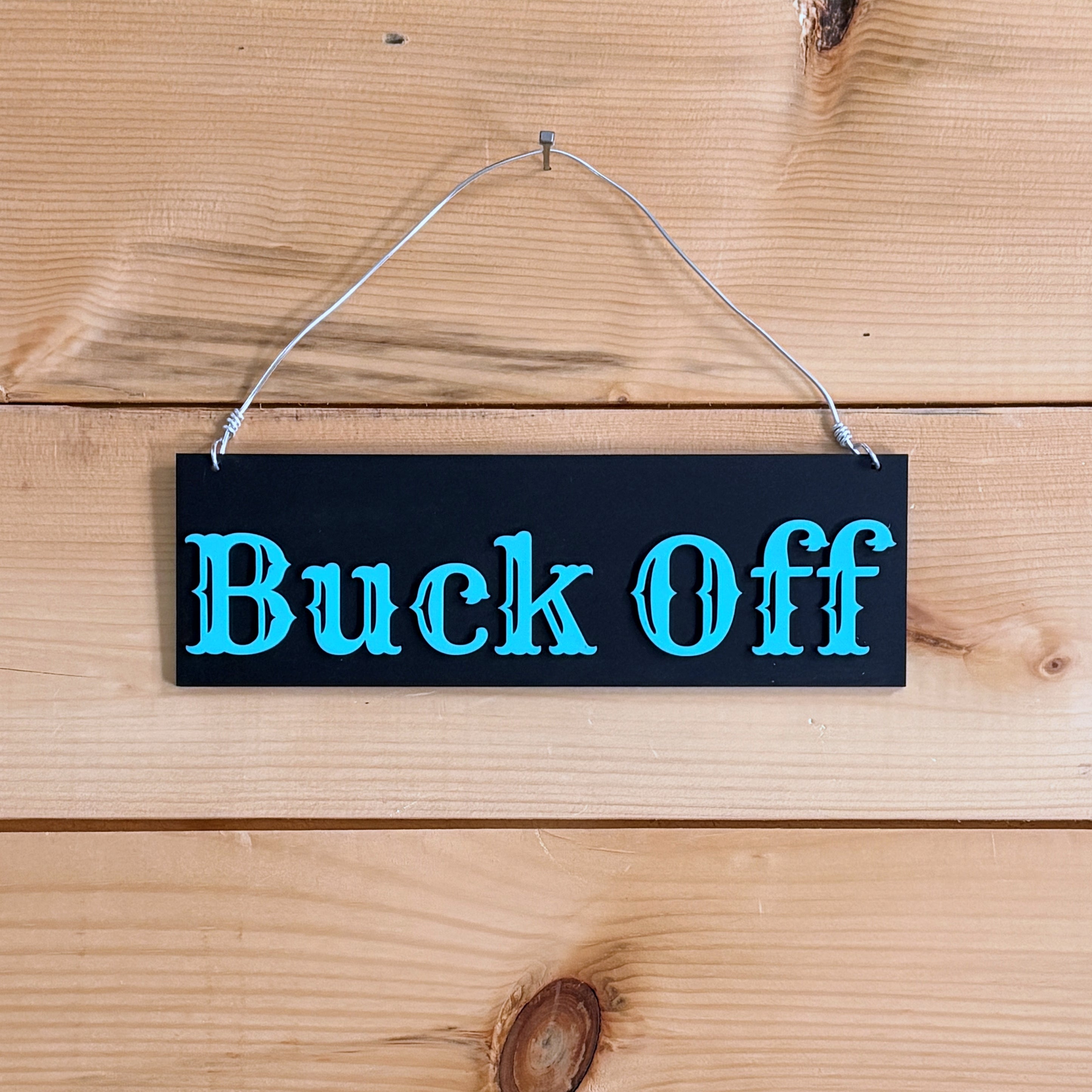 Buck Off sign