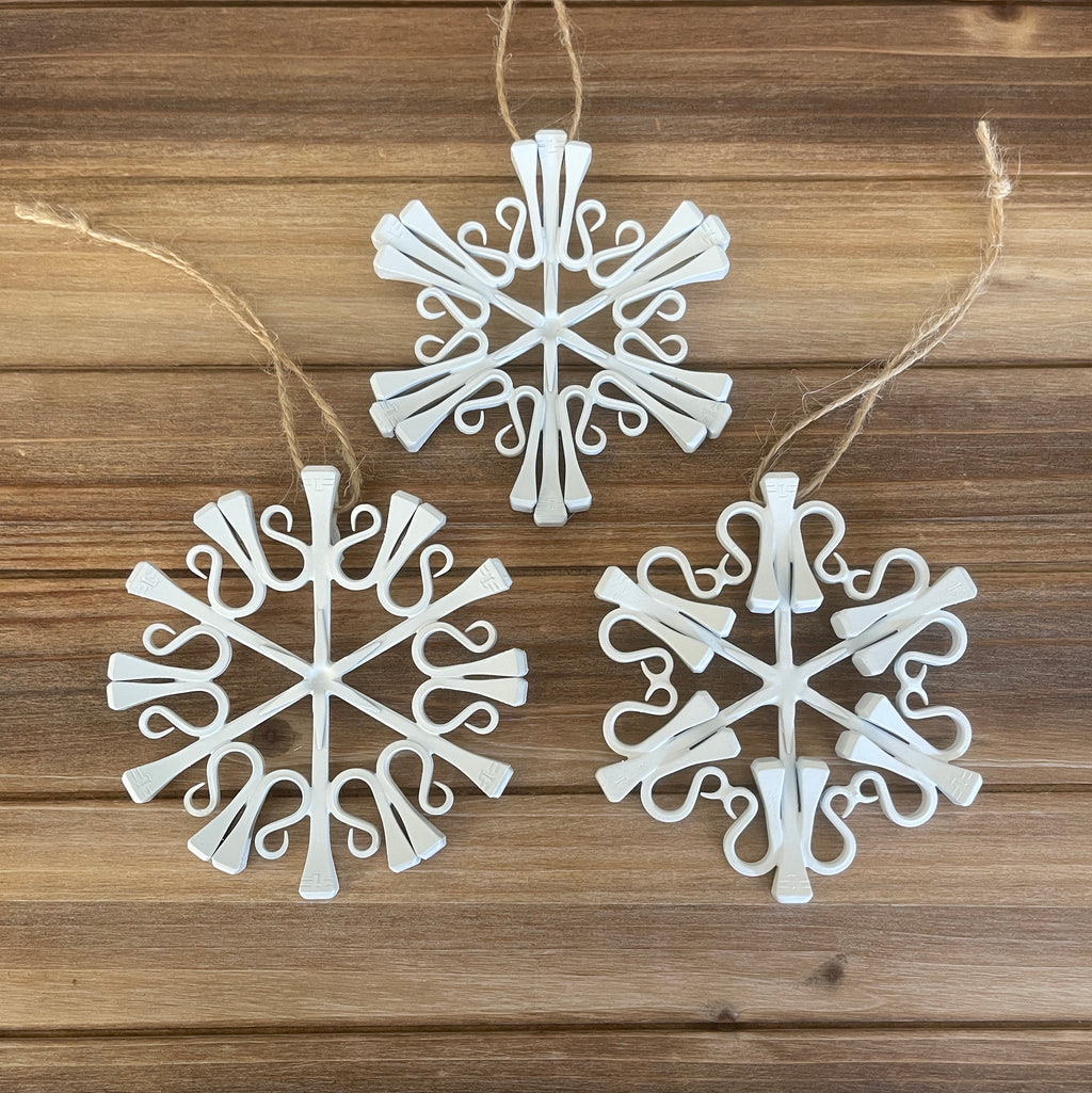 Horse shoe nail snowflake ornaments painted white
