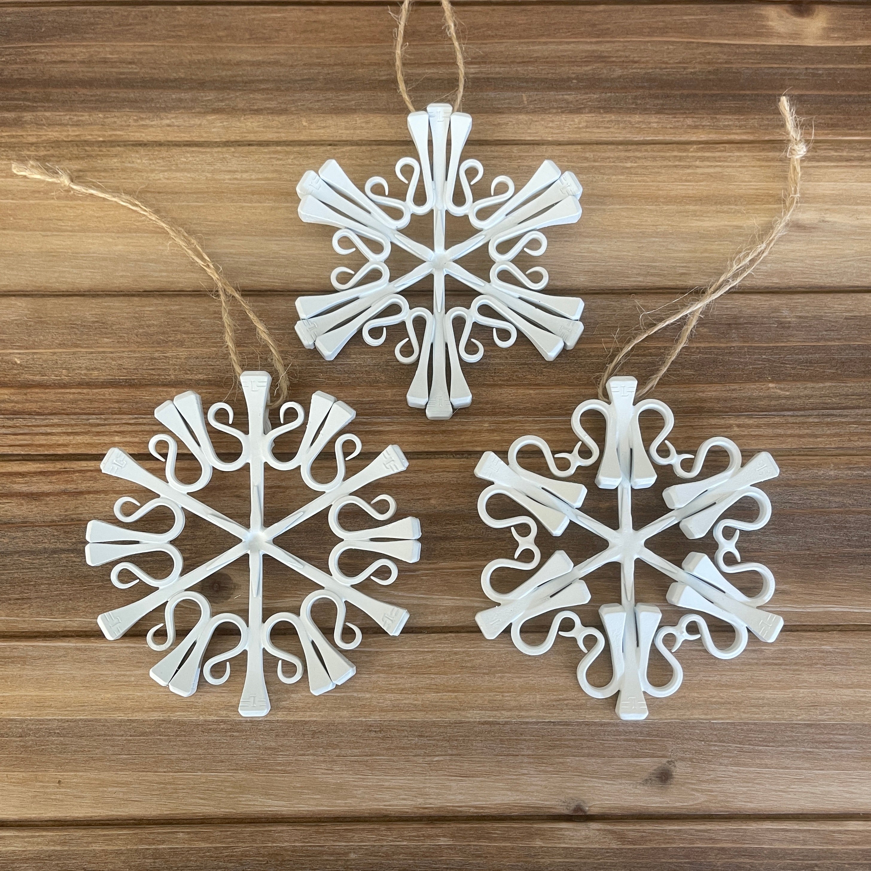 Horse shoe nail snowflake ornaments painted white